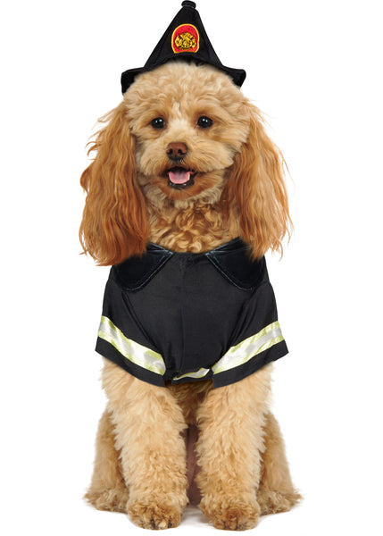 Cockapoo dog smiling while wearing Pets Fearless Fire Fighter Costume, featuring a classic black firefighter‑style jacket with short sleeves, detailed with bold yellow reflective stripes across the arms and body; includes a matching black firefighter hat accented with a red and yellow fire department emblem at the front