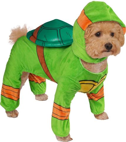 Pets TMNT Teenage Mutant Ninja Turtles Michelangelo Costume featuring  a full‑body plush green jumpsuit designed with a soft, stretchy fit that covers the torso and legs, printed with turtle‑shell detailing on the back and a yellow belly shell panel on the chest; styled with orange wrap accents around the arms and legs to match Michelangelo’s look. The costume includes an attached green hood with an integrated orange eye mask band, recreating the classic TMNT face design, and a lightweight padded shell
