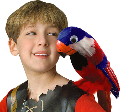 Boy posing with the Pirate's Feathered Parrot Costume Prop featuring a brightly colored faux‑parrot designed to perch realistically on the shoulder, covered in layered red, blue, white, and black synthetic feathers that create a vivid tropical look. The parrot includes a sculpted orange‑and‑black beak, a rounded head with a glossy eye detail, and a curved tail that drapes naturally down the back, giving the prop a lifelike silhouette straight out of classic pirate imagery