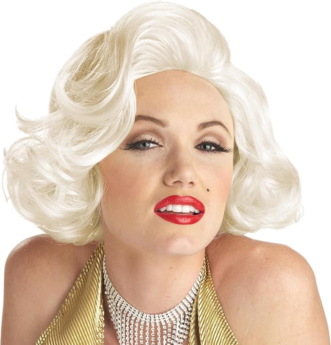 Woman in the Platinum Blonde Classic Marilyn Monroe Costume Wig Featuring a platinum blonde synthetic wig styled in a short to medium-length cut with soft, sculpted waves, designed with a deep side part, voluminous lift at the crown, and signature curled ends that frame the face in a classic vintage silhouette.