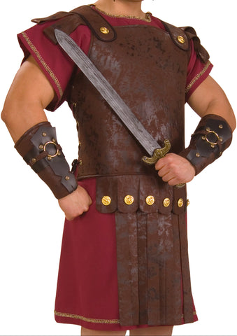 Man wearing the Roman Body Armor which features g a sculpted faux‑leather chest armor piece in deep brown tones, designed to mimic weathered Roman cuirass styling with a rigid, protective profile; detailed with raised armor contours across the torso and finished with decorative gold‑tone stud accents at the shoulder tabs and waist. The armor is styled with a matching segmented skirt panel at the bottom, fastened with gold‑tone round buttons that reinforce the classic ancient‑warrior 