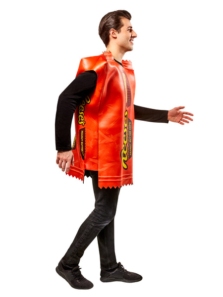 Running view of a Man in Adults Reese's Peanut Butter Cup Candy Costume featuring a bold, oversized tunic designed to resemble a classic Reese’s wrapper, printed in vibrant orange with large yellow “Reese’s” lettering and a detailed image of a sliced peanut butter cup at the top; styled with crimped “wrapper” edges at the neckline and hem for a realistic candy‑bar effect. The lightweight, sleeveless design slips easily over clothing, creating a full‑body candy package silhouette that’s instantly recognizabl
