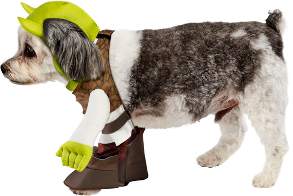 Schnoodle wearing the Pets Shrek Costume featuring a full‑body outfit styled to recreate Shrek’s iconic look with a soft white tunic base and a printed brown vest panel across the chest, accented with lace‑up detailing at the front; the costume includes attached long sleeves with green ogre hands at the ends for a playful illusion, along with matching padded leg coverings and brown boot‑style cuffs. The look is completed with a green Shrek hood featuring the signature rounded ogre ears