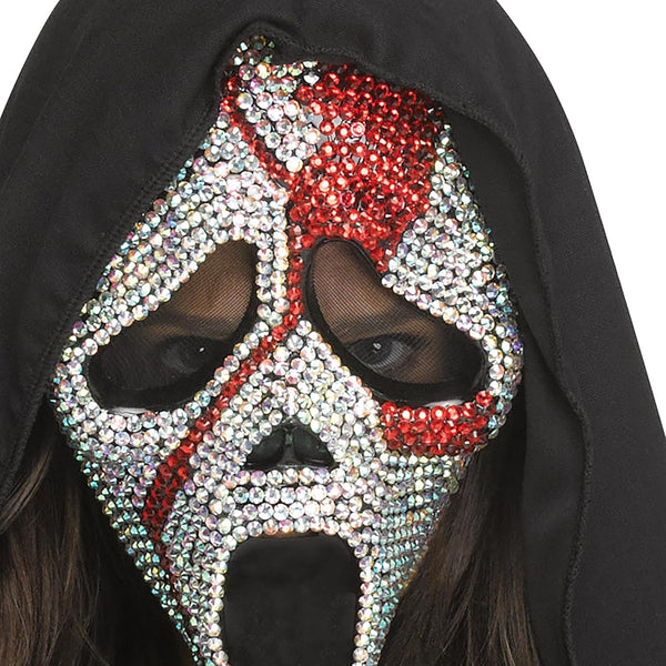 Close up of the Scream Ghost Face Bloody Bling Costume Mask and Knife Set featuring a dramatic Ghost Face mask covered in sparkling rhinestone‑style embellishments, detailed with bold red “blood splatter” accents layered over the bling for a striking contrast. The mask includes an attached black hooded drape for a classic silhouette, and is paired with a matching molded plastic knife prop featuring a silver‑tone blade with red blood detailing and a black handle, completing the coordinated slasher look