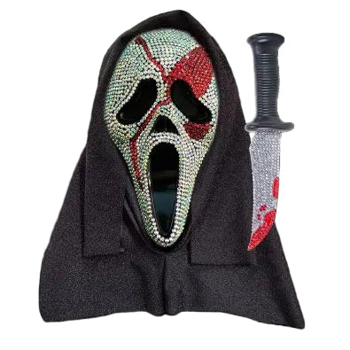 Scream Ghost Face Bloody Bling Costume Mask and Knife Set featuring a dramatic Ghost Face mask covered in sparkling rhinestone‑style embellishments, detailed with bold red “blood splatter” accents layered over the bling for a striking contrast. The mask includes an attached black hooded drape for a classic silhouette, and is paired with a matching molded plastic knife prop featuring a silver‑tone blade with red blood detailing and a black handle, completing the coordinated slasher look