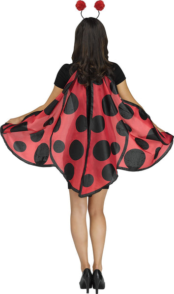 Back of a woman wearing the Soft Ladybug Costume Accessory Kit which includes a pair of lightweight fabric wings and a matching headband; the wings are designed in a classic ladybug style with bright red fabric and bold black polka dots, finished with black trim and a center back panel for structure. The headband is styled with two flexible antennae topped with soft red pom‑pom ends, completing the instantly recognizable ladybug silhouette