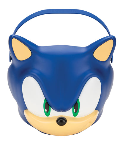 Sonic the Hedgehog Jumbo Trick or Treat Pail Bucket
Features a large, mold plastic bucket designed in the shape of Sonic’s iconic face, complete with bright blue coloring, oversized white eye panels, green iris details, and a signature smirk. The design includes raised contouring for added dimension, along with a sturdy curved handle across the top for easy carrying. The bucket measures approximately 7.5 inches tall and just under 8 inches wide, offering a roomy interior for candy or small items