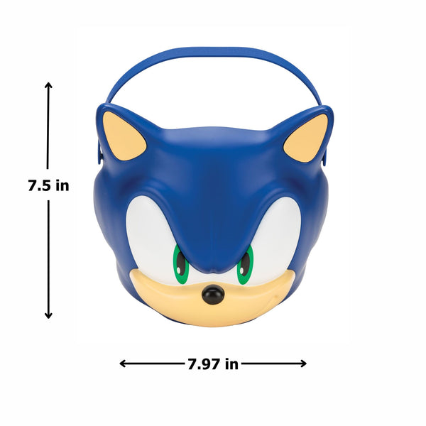 MeasurementsSonic the Hedgehog Jumbo Trick or Treat Pail Bucket
Features a large, mold plastic bucket designed in the shape of Sonic’s iconic face, complete with bright blue coloring, oversized white eye panels, green iris details, and a signature smirk. The design includes raised contouring for added dimension, along with a sturdy curved handle across the top for easy carrying. The bucket measures approximately 7.5 inches tall and just under 8 inches wide, offering a roomy interior for candy or small items