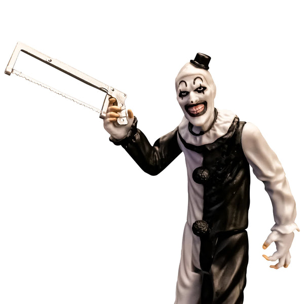 Terrifier Art the Clown 5" Collector's Action Figure Collectible carrying a hacksaw close up view