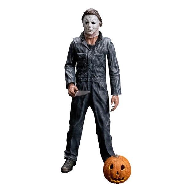 Halloween 1978 Michael Myers 8" Collector's Action Figure Collectible Toy in gray coveralls and white mask while holding a knife with jack-o-lantern accessory, front view