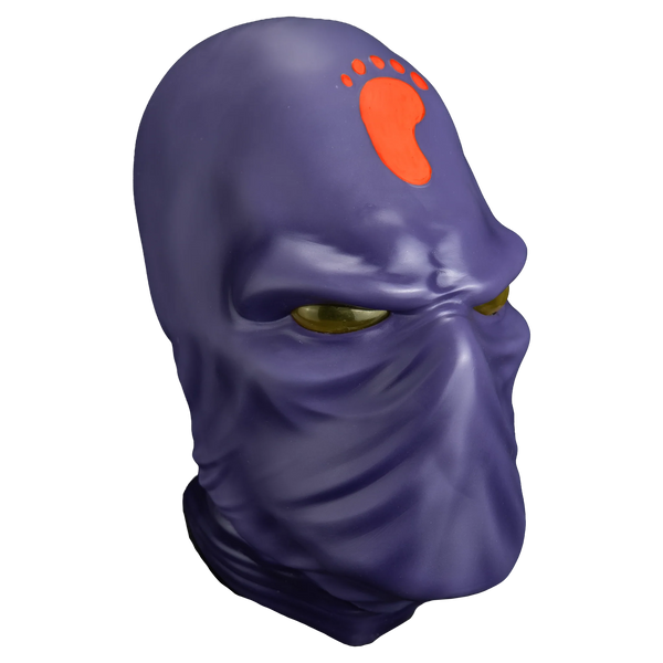 Teenage Mutant Ninja Turtles Foot Soldier Vinyl Costume Mask
features a vinyl sculpt in deep purple with smooth armored contours, angular face plating, narrow aggressive eye slits, and sharp geometric lines, accented with the orange Foot Clan insignia printed across the forehead, right profile