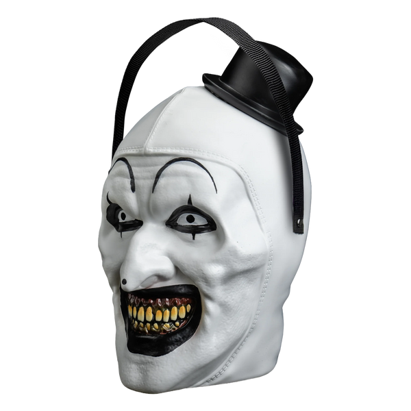 Terrifier Art the Clown Candy Treat Pail Bucket features a molded plastic bucket sculpted into Art’s haunting clown face, with stark chalk‑white skin, exaggerated blackened eye sockets, a wide toothy grin, sharp cheek contours, and smooth glossy paint that contrasts light and shadow; finished with bold monochrome detailing, an integrated carry handle, and a removable had lid that pops off, left profile