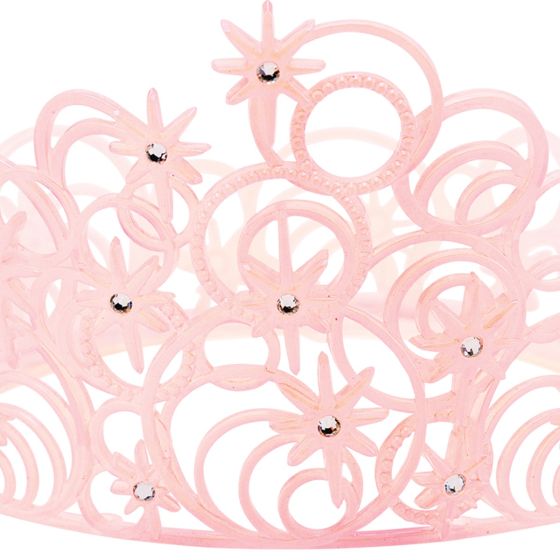 Close up of The Wizard of Oz Wicked Glinda the Good Witch Tiara Costume Accessory Featuring a light pink plastic tiara designed with interconnected swirling circular patterns and raised starburst accents, this accessory includes embedded clear gem details placed throughout the design for added decoration. The openwork structure creates a layered look, with curved shapes and cutout sections forming a rounded crown silhouette.