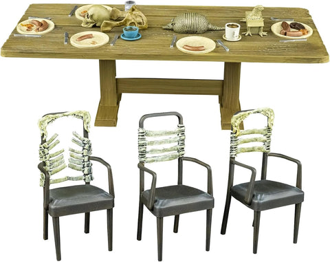 The Texas Chainsaw Massacre Dinner Scene Playset 5" Collector's Action Figure Collectible diorama showing the Sawyer family dinner scene inspired by The Texas Chainsaw Massacre of a wooden dining table with chairs and miniature food and tabletop items 