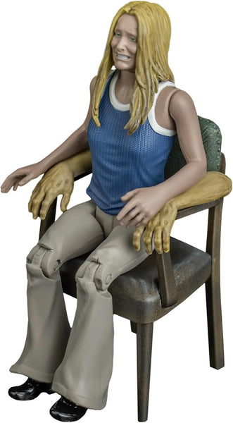 The Texas Chainsaw Massacre Dinner Scene Playset 5" Collector's Action Figure Sally Collectible Toy Figure  sitting on a chair, wearing a blue sleeveless top and beige pants