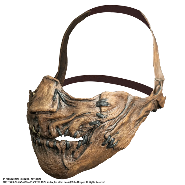 The Texas Chainsaw Massacre The Beginning Leatherface Muzzle Costume Mask of Leatherface's menacing muzzle mask with stitch and leather details and an adjustable leather strap, left side profile