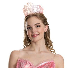 Woman in the Wizard of Oz Wicked Glinda the Good Witch Tiara Costume Accessory Featuring a light pink plastic tiara designed with interconnected swirling circular patterns and raised starburst accents, this accessory includes embedded clear gem details placed throughout the design for added decoration. The openwork structure creates a layered look, with curved shapes and cutout sections forming a rounded crown silhouette.