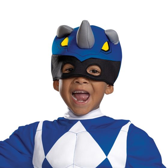 Headpiece of the Toddlers Mighty Morphin Power Rangers Blue Ranger Muscle Costume Featuring a full-length blue jumpsuit with printed white diamond patterns across the chest and sleeves, this costume includes padded muscle detailing in the torso and arms for a sculpted appearance. The design incorporates an attached belt at the waist with a circular emblem at the center and is paired with a soft character headpiece designed with a dinosaur-inspired shape, including small horn details and eye openings