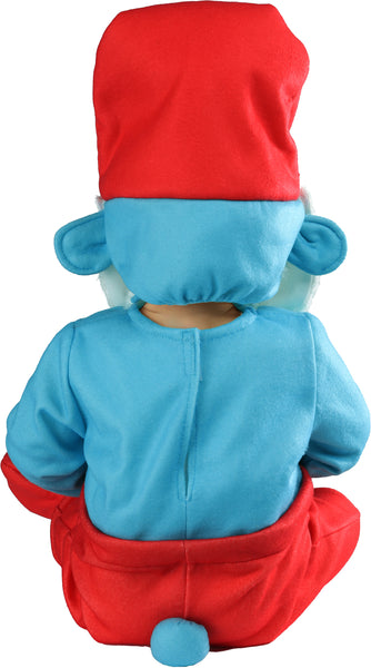 Back view of a toddler in the Toddlers The Smurfs Papa Smurf Costume featuring a one‑piece jumpsuit with a bright blue long‑sleeve upper section with attached hand covers and red pants with attached shoe covers, and topped off with the signature red Papa Smurf hat with an attached long white beard