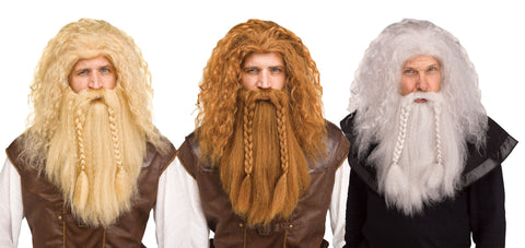 Viking Wig & Beard Costume Accessory Set featuring a full, long synthetic wig paired with a matching extended beard, both styled with thick, textured waves and a rugged, untamed finish; the beard includes integrated braided sections that hang down the front for an authentic Norse warrior look. The set is available in multiple colors—including blonde, reddish‑brown, and white/gray—each designed to create a cohesive, full‑coverage Viking silhouette