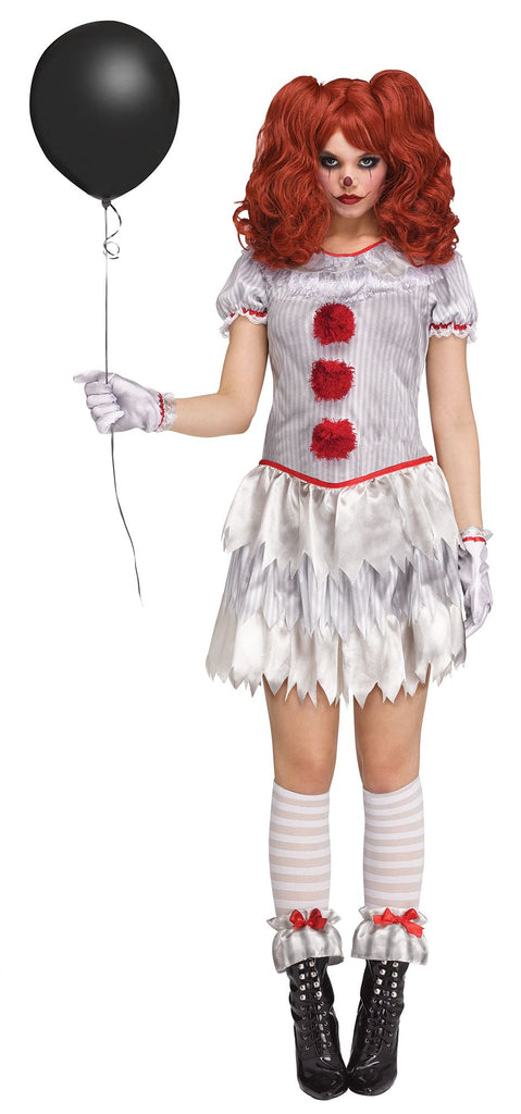 Woman standing in the Womens Carnevil Clown Costume featuring a short silver‑gray dress designed with a subtle vertical stripe pattern, accented with red trim at the neckline and sleeves and three large red pom‑pom buttons down the front. The dress includes puffed short sleeves with ruffle edging and layered jagged skirt panels for a torn, carnival‑style finish. The look is completed with matching satin‑style gloves, knee-high socks, and ruffled ankle cuffs with red bow accents