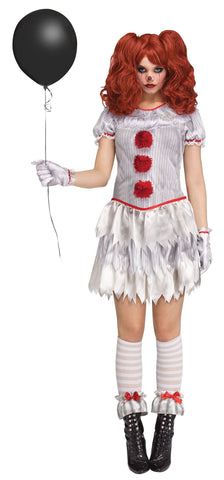 Woman standing in the Womens Carnevil Clown Costume featuring a short silver‑gray dress designed with a subtle vertical stripe pattern, accented with red trim at the neckline and sleeves and three large red pom‑pom buttons down the front. The dress includes puffed short sleeves with ruffle edging and layered jagged skirt panels for a torn, carnival‑style finish. The look is completed with matching satin‑style gloves, knee-high socks, and ruffled ankle cuffs with red bow accents