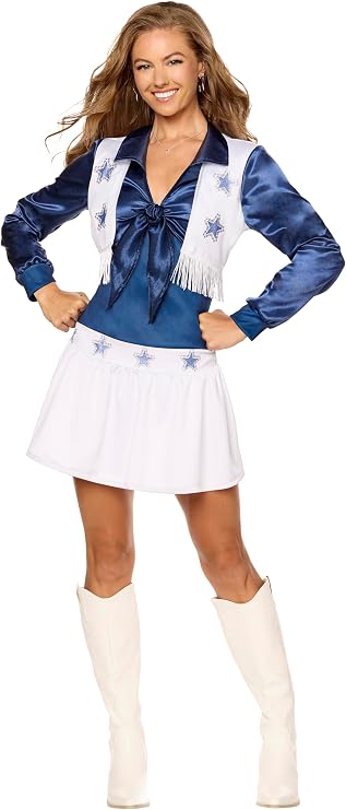 Woman posing in the Womens Deluxe Dallas Cowboys Cheerleader Costume Dress Featuring a deluxe cheerleader-style costume dress designed in blue and white with a satin-look finish, long blue sleeves, a blue front tie accent at the neckline, and a white vest-style overlay trimmed with decorative fringe. The dress is detailed with metallic-look star appliqués on the vest and skirt, a fitted blue waistband, and a short white pleated skirt.