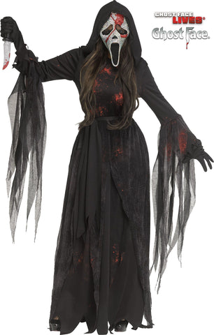 Woman posing in the Womens Scream Bloody Bling Ghost Face Costume Dress featuring a long black hooded dress designed with a fitted bodice and flowing skirt, accented with layered sheer gauze panels and jagged torn-style sleeve drapes for added movement; styled with scattered red “blood splatter” detailing across the fabric and finished with matching black gloves for a complete look. The costume includes a rhinestone‑covered Ghost Face mask embellished with sparkling crystal‑style stones and bold red accents