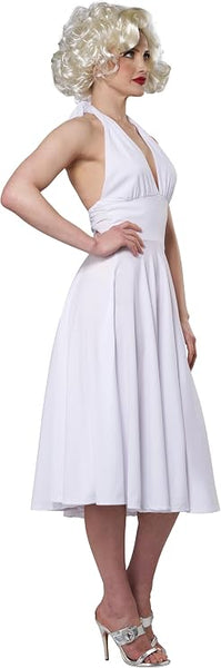 Side view of Woman posing in the Womens Sexy Marilyn Costume Dress Featuring a white halter-style dress designed with a plunging V-neckline, gathered bodice, and a fitted waist that flows into a full, pleated skirt falling to knee length, finished with an open back and lightweight fabric that moves freely for that signature billowing effect.