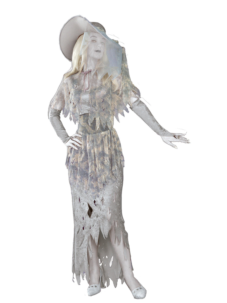 Woman posing in the Womens Ghostly Gala Gal Costume featuring a full‑length gown in muted pale gray tones layered with tattered, semi‑sheer fabric overlays that create a drifting, worn appearance; designed with jagged, uneven edges at the sleeves, bodice, and hem, subtle shredded cutouts throughout the skirt, and long glovelets that extend the ghostly silhouette; completed with a wide‑brim gray hat topped with a sheer veil that drapes down over the face and shoulders, tying the entire haunted look 