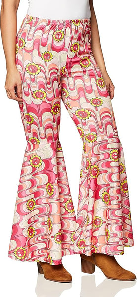 Woman posing in the Womens Pink Flower Power Bell Bottom Hippie Costume Pants which feature a high‑waisted, form‑fitting design through the hips and thighs that dramatically flares into wide bell bottoms below the knee; covered in an all‑over retro swirl pattern in shades of pink, white, and coral, accented with repeating yellow and orange flower motifs that pop against the psychedelic background, creating a bold, unmistakable 1960s–1970s silhouette