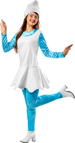 Woman posing in Womens The Smurfs Smurfette Costume featuring a one-piece dress designed to appear as a sleeveless white mini‑dress with a softly flared skirt layered over a fitted sky‑blue long‑sleeve top and matching sky‑blue leggings, and completed with a tall white Smurf