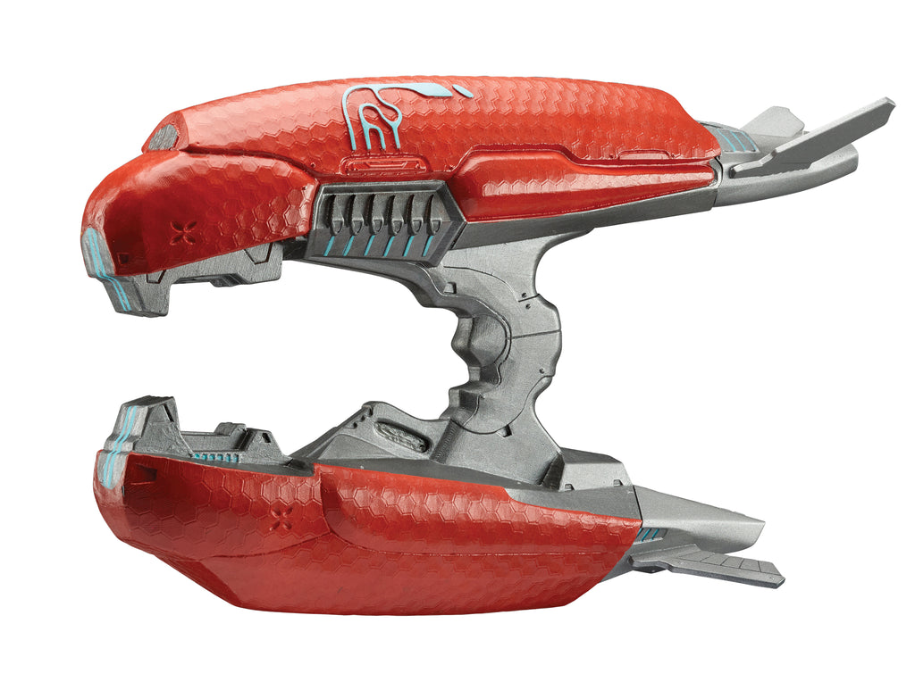 Xbox Halo Plasma Rifle Costume Prop Weapon Featuring a dual-pronged plasma rifle prop with a curved, futuristic design, this accessory is constructed with a red upper and lower body panel featuring a textured hex pattern and light blue accent details. The center section includes a gray handle grip with molded finger grooves and angular mechanical elements, while the front displays two forward-pointing prongs and layered structural detailing that completes the signature sci-fi weapon shape.