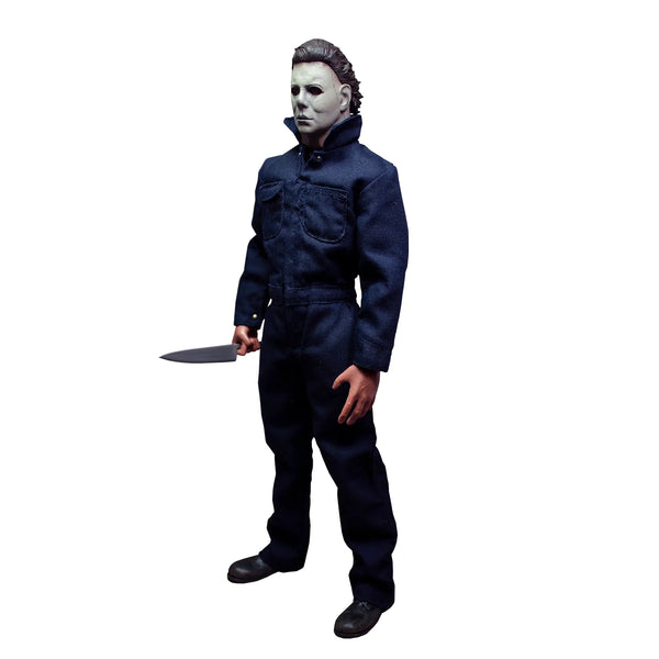 Halloween 1978 Michael Myers 12-inch action figure horror collectible in navy blue coveralls and wearing white mask and holding knife left side profile