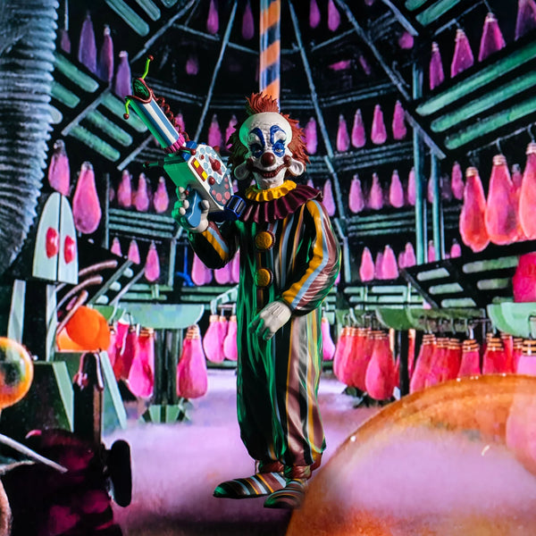 Killer Klowns from Outer Space Rudy 8-inch collectible action figure collectible in striped clown suit  holding popcorn gun in cinematic image