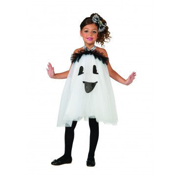 Girl posing in the Girls Ghost Gal Tutu Dress Costume featuring a ballerina‑style white tutu dress designed with layers of soft white tulle; the front of the dress is decorated with a friendly glitter‑black ghost face graphic, including happy eyes and a smiling mouth. The neckline is finished with a black tulle ruffle trim, attached to a halter‑style neck strap printed with black‑and‑white swirl accents. The look is completed with a coordinating black‑and‑white bow headband with a small ghost 