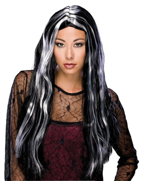 Long Witch or Vampira Wig features  a 24" long, sleek, straight long‑hair style that falls smoothly past the shoulders, designed with a subtle center part that frames the face evenly. Black and White creates an instantly theatrical effect, great for stylized gothic characters, witchy pop‑culture icons, or dramatic fantasy roles that play with light‑versus‑dark symbolism in a bold, visual way.